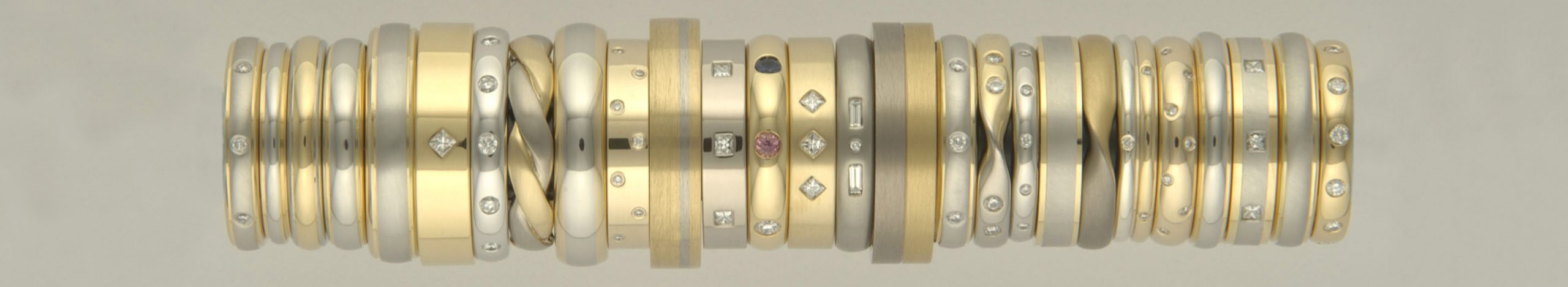 Tower of two coloured wedding rings